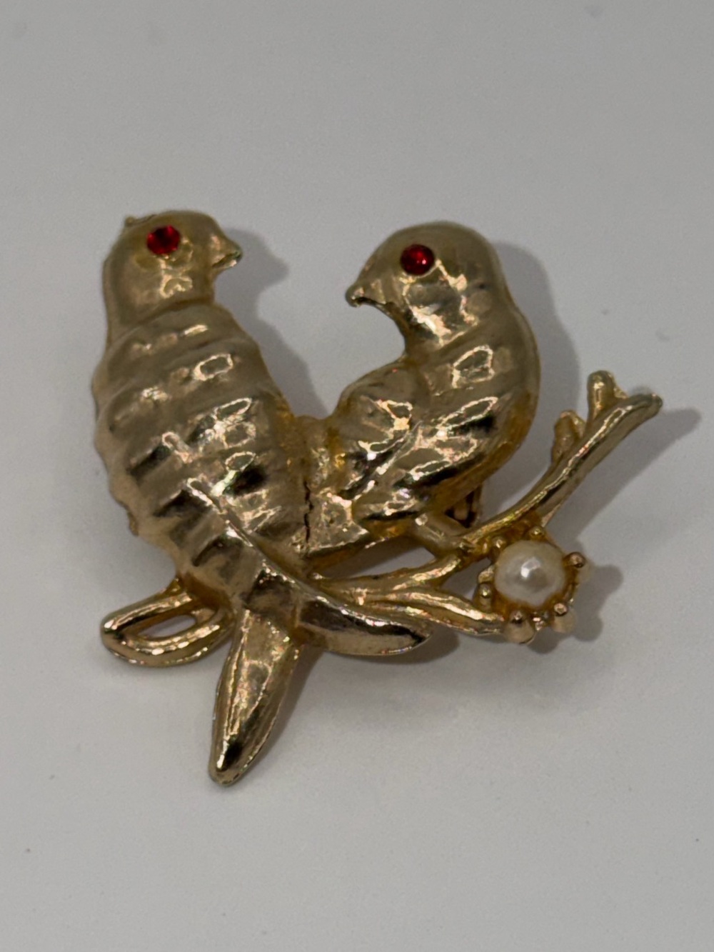 Gold-Tone Two Birds Brooch with Red Eyes and Pearl Accent